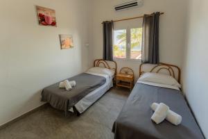 En eller flere senge i et værelse på Villa KATARINA + 51 billeder