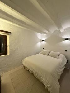 Postel nebo postele na pokoji v ubytování Casa Les Ferreres Montblanc