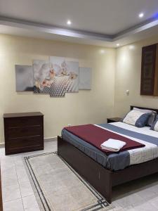 Ένα ή περισσότερα κρεβάτια σε δωμάτιο στο Chez Pieume