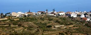 a group of buildings on top of a hill at Casa rinconcito de Arico in Los Gavilanes