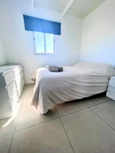 Ένα ή περισσότερα κρεβάτια σε δωμάτιο στο Casa rinconcito de Arico +5 φωτογραφίες