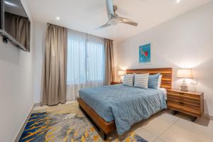 Ένα ή περισσότερα κρεβάτια σε δωμάτιο στο La Vista 2 - Diriá Tamarindo +16 φωτογραφίες