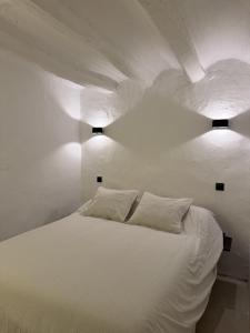 Postel nebo postele na pokoji v ubytování Casa Les Ferreres Montblanc