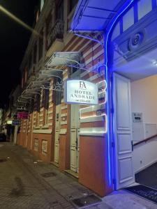 a sign on the side of a building at FA Hotel Andrade in Florianópolis +5 photos