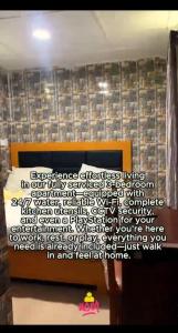 a sign on a wall with writing on it at APARTMENT for RENT in Baruwa