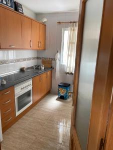 Køkken eller tekøkken på Amarillo Apartment