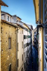 a view of an alley between two buildings at Pop Tower Florence in Florence