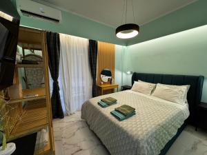 Ένα ή περισσότερα κρεβάτια σε δωμάτιο στο Luxury Living Patras