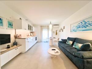 O bucătărie sau chicinetă la Douc Evasion - Appartement climatisé proche Montpellier, Parc Expo et Aéroport, avec parking sécurisé et accès rapide aux plages +10 fotografii