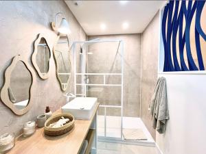 O baie la Douc Evasion - Appartement climatisé proche Montpellier, Parc Expo et Aéroport, avec parking sécurisé et accès rapide aux plages