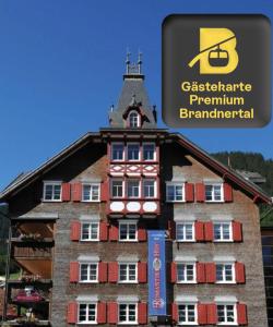 a building with a sign on top of it at Romantikhus in Brand