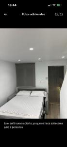 a picture of a bed in a room at Casita Playa Yolanda in Santa Pola