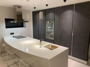 Kuchyň nebo kuchyňský kout v ubytování Ourthe Basse