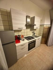 Η κουζίνα ή μικρή κουζίνα στο Casa Mimì +1 φωτογραφίες