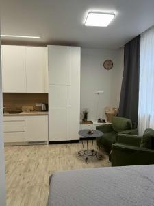 Kuchyň nebo kuchyňský kout v ubytování Saldūs apartamentai