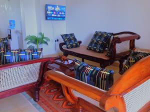 Μια τηλεόραση ή/και κέντρο ψυχαγωγίας στο Luxury 2BR Apartments