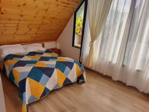 Ένα ή περισσότερα κρεβάτια σε δωμάτιο στο Cabañas El Girasol