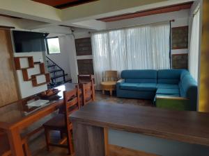 Χώρος καθιστικού στο Cabañas El Girasol