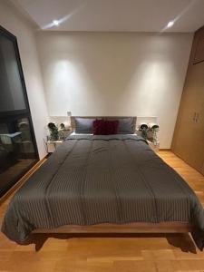 Кровать или кровати в номере Casablanca Finance City 2Bdr