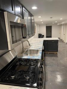 Η κουζίνα ή μικρή κουζίνα στο Grenshaw Guesthouse