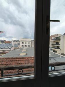 a view of a city from a window at Splendid T4 - Spacious - Air conditioning - 6 People in Pau