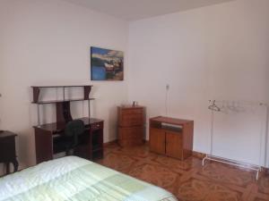 Postel nebo postele na pokoji v ubytování Casa espaço e aconchego