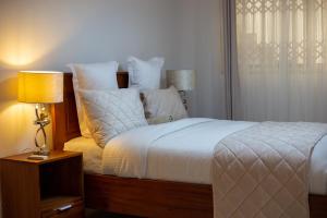 Ένα ή περισσότερα κρεβάτια σε δωμάτιο στο Haven Seven Property - 1 bedroom, 2 bedroom, 3 bedroom Executive options