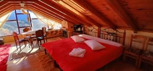 En eller flere senge i et værelse på Ξενώνας ΔΡΟΣΟΣΤΑΛΙΑ Some of Attic