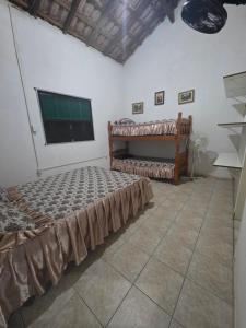 Ένα ή περισσότερα κρεβάτια σε δωμάτιο στο rancho da bohemia