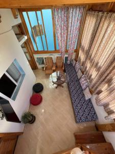 an overhead view of a living room with a couch at Seaside House in Imsouane