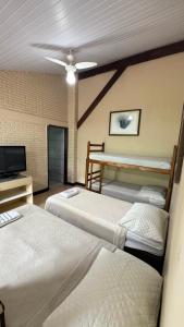 Postel nebo postele na pokoji v ubytování Chacara Descanso do Rei