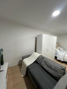 Ένα ή περισσότερα κρεβάτια σε δωμάτιο στο genesys