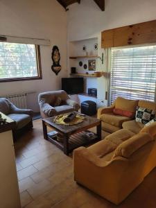 Et opholdsområde på Casa La Falda 4 hab + 37 billeder