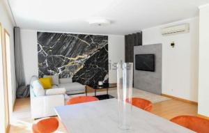 Et tv og/eller underholdning på Apartamento MARINA RESIDENCE