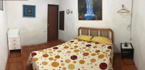 Ένα ή περισσότερα κρεβάτια σε δωμάτιο στο Hospedaje Maluli 01