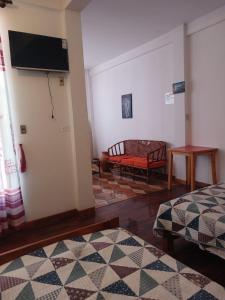 La Fábula-Verde في كوباكابانا: غرفة بسريرين وتلفزيون على جدار