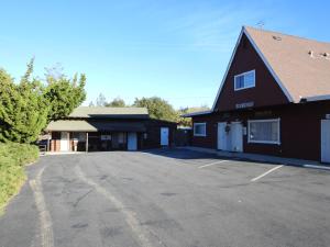 an empty parking lot in front of a building at Historic Gold Town Loft A-Frame 1 Bedroom with sofa sleeper WIFI in Julian