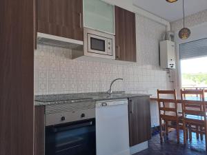 Η κουζίνα ή μικρή κουζίνα στο Torre Plaza 4