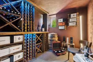 a wine tasting room with a bunch of wine bottles at Villa in the Heart of Aarhus in Aarhus