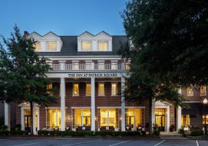 a brick building with the inn at baptist college at The Inn at Patrick Square in Clemson