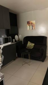 O zonă de relaxare la Home away from home +4 fotografii