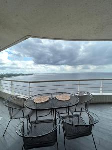 En balkon eller terrasse på Tropical VIsão da Ponta Negra