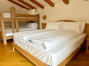 Ένα ή περισσότερα κρεβάτια σε δωμάτιο στο HC Hotel Garni - Rooms and Apartments