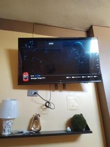 TV a/nebo společenská místnost v ubytování Departamento Moderno y Acogedor con aire acondicionado