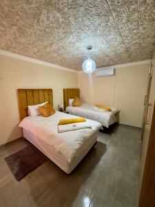 En eller flere senge i et værelse på Inkinibe Self Catering