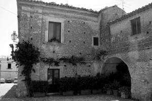 a black and white photo of an old building at Casa Daniele in Gerace