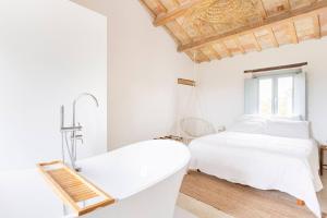 Postel nebo postele na pokoji v ubytování Casa Caminate - La Quercia