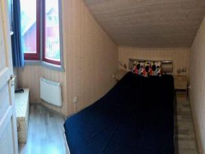 En eller flere senge i et værelse på skandinavisches Ferienhaus in Mirow + 22 billeder