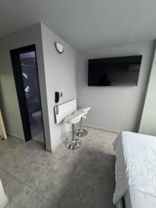 Μια τηλεόραση ή/και κέντρο ψυχαγωγίας στο Apartaestudio