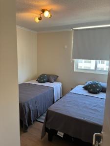 Ένα ή περισσότερα κρεβάτια σε δωμάτιο στο Jardines del Pacifico +14 φωτογραφίες